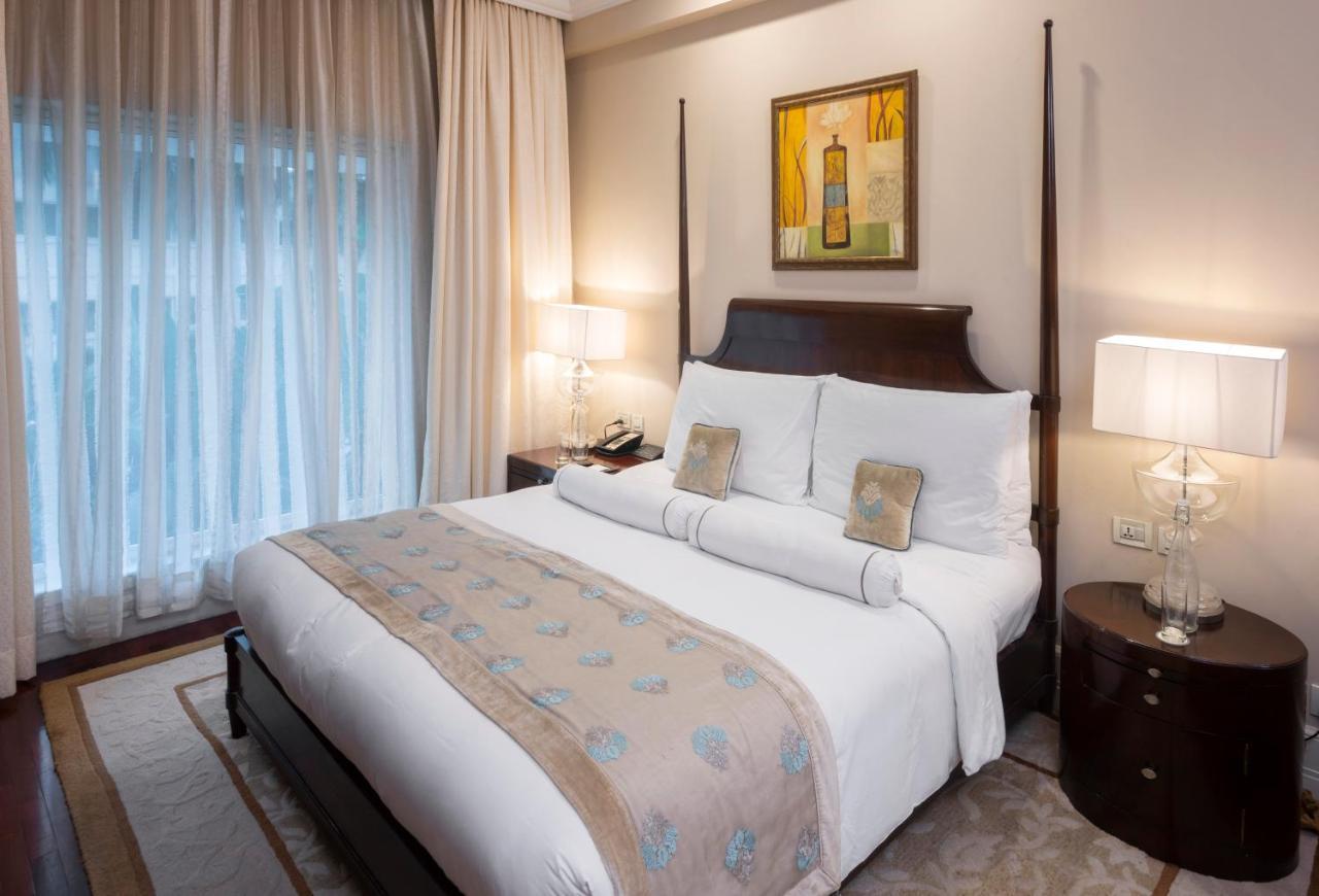 The Claridges New Delhi Hotel Luaran gambar A bedroom at the Taj Bengal