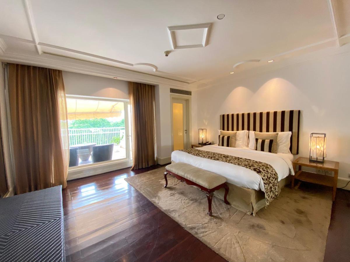 The Claridges New Delhi Hotel Luaran gambar A bedroom at the Taj Mahal Palace